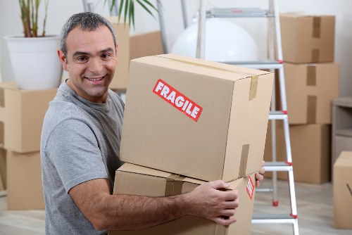Removal team planning a move in a Pimlico street