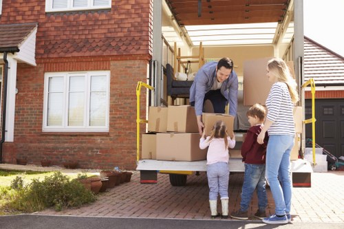 Local furniture removal service preparing items for transport near Pimlico