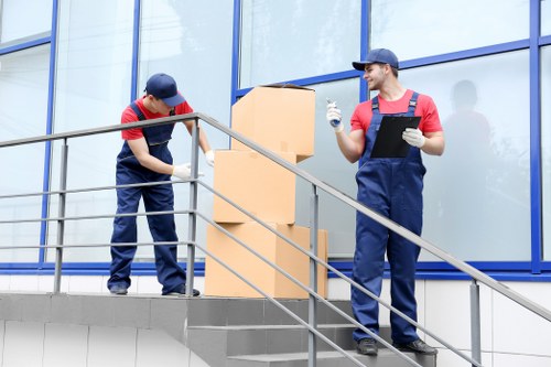 Moving team preparing items safely with insurance and protection in place