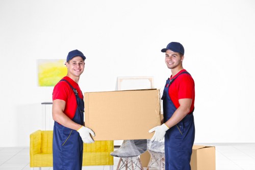 Careful loading of furniture for urgent removals near Pimlico