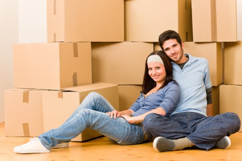 Movers transporting furniture from a Pimlico flat