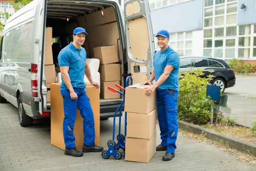 Packed office equipment ready for transport during a Pimlico business move